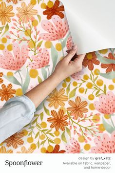 a person is laying on top of a flowered wallpaper with the text spoonflower design by craft kits available on fabric, wallpaper and home decor