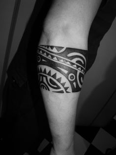 a man with a tattoo on his leg