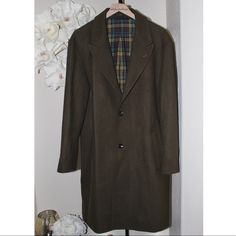 Saturdays New York City Kawano Wool Blend Overcoat Color: Military Olive Inside: Plaid Multicolor Shell 50% Wool 50% Polyester Body Lining 50% Cotton 50% Tencel Sleeve Lining 100% Polyester Green Fitted Long Coat, Classic Green Winter Outerwear, Tailored Green Winter Outerwear, Tailored Green Outerwear For Winter, Green Winter Outerwear With Notch Lapel, Classic Green Workwear Outerwear, Classic Green Long Coat Outerwear, Tailored Classic Green Outerwear, Classic Green Outerwear For Work