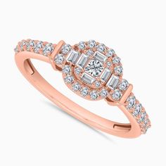 a rose gold engagement ring with baguetts and diamonds