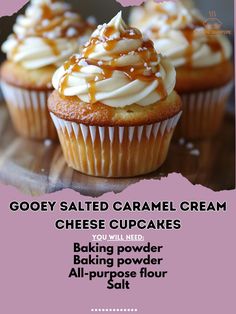 some cupcakes with icing and caramel are on a wooden table next to the words gooey salted caramel cream cheese cupcakes