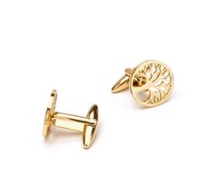 Tree Cufflinks| Tree of Life Cuff links| Gold Round Tree Vintage Cufflinks| Life Tree Cuff Links| Men's Suit shirt Cuff Links Groomsmen Gift -------------------------------------------- Celebrate the circle of life with these enchanting gold tree of life cufflinks, expertly crafted from durable 316L stainless steel and embellished with opulent 18K gold plating.  Each cufflink features a beautifully detailed tree of life motif, symbolizing growth, strength, and interconnectedness. The intricate b Tree Cuff, Gold Tree Of Life, Groomsmen Cufflinks, Handmade Cufflinks, Suit Shirt, Personalized Cufflinks, Life Tree, Gold Tree