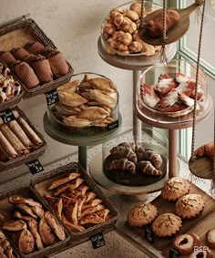 an assortment of baked goods displayed on trays