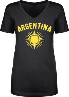 a black t - shirt with the word argentina in yellow letters on it and an image of