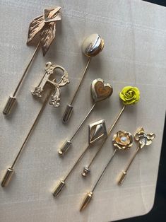 Assorted vintage stick pins, hat pins, coat pins. Each sold separately.  Beautiful vintage pins. Each sold separately. See photos. Vintage Safety Pin Brooches For Gifts, Vintage Gold Brooches With Decorative Buttons, Vintage Brooches With Buttons For Gift, Vintage Brooches With Buttons As Gift, Hat Pins Vintage, Pins Hat, Historical Accessories, Dress Pins, Coat Pin