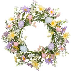 an easter wreath with flowers and eggs on it, isolated against a white background photo