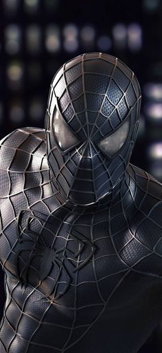 a close up of a person wearing a spider man suit with his hands behind his head