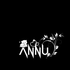 the word annu is written in white on a black background with flowers and leaves