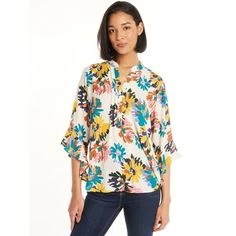 Take your casual outfits to the next level with The Pioneer Woman's Pleated Ruffle Sleeve Blouse. This pretty blouse features a pullover design and a comfortable, relaxed fit to keep you feeling and looking your best all day long. Ruffled sleeves and a pleated front placket offer a trendy look to top everything from your favorite jeans to skirts with ease. Only at Walmart. Color: Off-White.  Gender: female.  Age Group: adult.