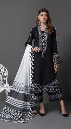 Anaya By Kiran Chaudhry Kiara Monochrome Mystique 2022 Unstitched Black Dupatta With Digital Print, Festive Black Palazzo Set With Printed Motifs, Eid Mulmul Sets With Digital Print, Black Printed Cotton Unstitched Suit, Black Cotton Unstitched Printed Suit, Black Dupatta With Printed Motifs, Black Cotton Dress With Dupatta, Black Cambric Dress, Black Printed Cotton Dupatta