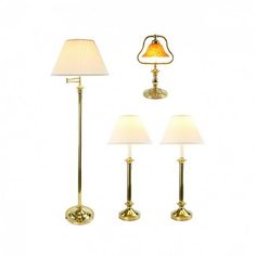 three lamps and one lamp shade on each side of the lamp, all in gold