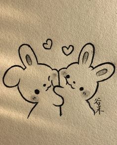 two mouses with hearts drawn on them