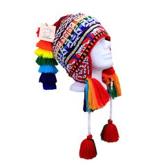 "FREE SHIPPING  FREE SHIPPING  This colorful Chullo is a handmade hat made by indigenous from the Andes in Pisac Cusco - PERU, woven in multicolored wool yarn, with ear flaps and decorated with beads all around, which are sewn one by one. This particular one has a design of the \"Andean Llama\",South American camelid from the Andean cultures. If laid flat, the Chullo alone is approximately 12\" long x 10.5\" wide. Including the pompoms on the bottom and all of the top, it measures from end to end 24\" approximately The CHULLO (in Aymara -Quechua: Ch'u llu) is a hat with earmuffs woven in alpaca wool or sheep wool and in combination with synthetic fibers. It is native to the South American Andean highlands, where it is used to protect against the cold weather. In Peru it is characterized by Multicolor Hippie Cap, Multicolor Bohemian Hat, One Size Fits Most, Bohemian Multicolor Adjustable Hat, Bohemian Multicolor Hat, Multicolor Bohemian Hat, Traditional Multicolor Hat One Size Fits Most, Traditional Multicolor Beach Hats, Traditional Festival Hat One Size, Multicolor Woven Festival Hat