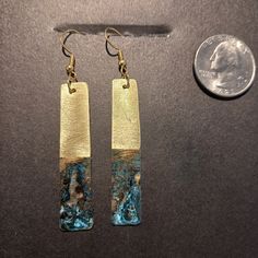 These Upcycled, reclaimed brass patina verdigris earrings are made from sanitized recycled brass. They are upcycled by various processes including first a meticulously cut, sanding, drilling, shaped, rough polished and then patinaed with our specialized process that specifically allows similar but not exacting patterns on each earring pair; followed by an acrylic overcoating. Then they are mounted with all new hypoallergenic ear wires. Each set is exquisitely unique.  We handcraft from reclaimed cleaned and sanitized materials. Many of our raw materials are derived from roofing, electrical, plumbing and building contractors we associate with.  THANK YOU, CONTRACTORS, for allowing us to rummage through your scrap heaps of metals Hand Forged Turquoise Brass Jewelry, Gold Electroformed Drop Earrings, Luxury Gold Electroformed Drop Earrings, Bohemian Patina Gold Jewelry, Gold Bohemian Earrings With Patina, Bohemian Gold Earrings With Patina, Artisan Bronze Brass Earrings, Soldered Turquoise Brass Earrings, Patina Brass Dangle Earrings