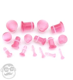 Pretty pink cat's eye glass plugs! Single flare shaped. Sizes / gauges range from 8g, 6g, 4g, 2g, 0g, 00g, 7/16", and 1/2". Sold in pairs starting at $12/pair. Orders over $20 ship free Cheap Festival Plug Earrings For Women, Handmade Cute Plug Earrings, Cute Plugs Ears, Gauge Jewelry, Angel Bites, Pretty Plugs, Pastel Skull, Tapers And Plugs, Cool Piercings