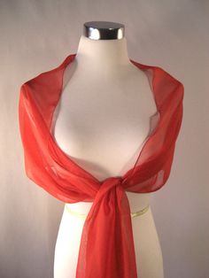 "IMPORTANT - Read all \"ITEM DETAILS\" before ordering. Evening Wrap - Red Chiffon Wedding Wrap - Shawl Stole Drape - Formal Red Chiffon Bridal Shawl - Extra Long Bridesmaid Scarf - Custom Made Lightweight, silky, sheer chiffon fabric. Red solid. A myriad of colors. Edges are serged with a classic rolled hem. ** Choice of squared or tapered ends. ** DIMENSIONS: Approximately 104 inches in length. Approximately 16 inches in width. Hand wash cool and lay flat or hang to dry. May be ironed with a w Bridesmaid Scarf, Bridesmaid Scarves, Evening Wrap, Wedding Scarf, Shawl Wedding, Red Shawl, Evening Wraps, Chiffon Shawl, Bridal Shawl