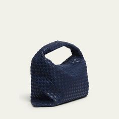 Bottega Veneta "Hop" hobo bag in denim intrecciato cotton and leather  Shoulder strap  Fold-over flap top with  Interior, one zip pocket  Approx. 9.4"H x 21.2"W x 5.1"D Made in Italy Designer Blue Shoulder Bag With Woven Leather, Designer Blue Woven Leather Shoulder Bag, Blue Intrecciato Weave Shoulder Bag, Blue Top Handle Shoulder Bag With Intrecciato Weave, Blue Top Handle Bag With Intrecciato Weave, Blue Woven Leather Top Handle Shoulder Bag, Intrecciato Weave Hobo Shoulder Bag For On-the-go, Designer Blue Bags With Braided Handles, Modern Blue Woven Leather Bag