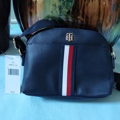 Nwt- Tommy Hilfiger Leather Crossbody Bag Description - Tommy Hilfiger Monogram Plaque On Front With A Front Pocket. - One Main Compartment. - One Interior Zipped Pocket. - Adjustable Crossover Strap. - Zip Closure. -Measurements: 8.5 Inches, A Height Of 6.5 Inches, And A Depth Of 3.5 Inches. -This Tommy Hilfiger Crossbody Bag Is Perfect For Any Occasion. Tommy Hilfiger Crossbody Shoulder Bag For Travel, Tommy Hilfiger Everyday Crossbody Shoulder Bag, Tommy Hilfiger Crossbody Travel Bag, Tommy Hilfiger Travel Crossbody Bag, Everyday Blue Tommy Hilfiger Shoulder Bag, Tommy Hilfiger Crossbody Shoulder Bag For Daily Use, Tommy Hilfiger Shoulder Bag With Adjustable Strap, Elegant Tommy Hilfiger Bag With Adjustable Strap, Elegant Tommy Hilfiger Bag