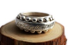 "Engraved personalised Statement ring. FREE EXPRESS SHIPPING! Your new jewelry direct to your door! The Hip Hop spiritual healing ring is the ultimate statement that you're alive and free. This, 'Die Another Day,' ring captures that authentic rock spirit. It is a strong and sensual piece, where the silver or gold tone provides the perfect backdrop for this seriously stylish Old English font. This one-of-a-kind ring is sure to wow everyone and put a smile on your face each and every morning. To c 1940s Art Deco, 1940s Art, English Font, Old English Font, Sweet Ring, Deco Blue, Hip Hop Jewelry, Pig Skin, Black Leather Bags