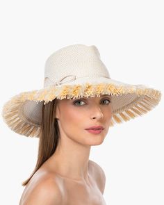 If you are looking for a woman's sun hat for sale online that is sure to turn heads, look no further! Named from the Caribbean Island that has endless beaches and warm turquoise water, this sun hat made of Squishee®, is a show stopper. This flirty, tropical sun hat combines the pinched crown of a fedora with a wide brim, edged all around with glamorous straw fringe. Wherever you adventure, from St. Barths to Antibes, approving smiles are sure to follow! Squishee® straw is a sustainable man-made Wide Brim Pool Hat, Short Brim Hat With Upf 50+ For Pool, Upf 50+ Short Brim Hat For Pool, Brimmed Pool Hat, Lightweight Short Brim Pool Hat, Lightweight Short Brim Hat For Pool, Upf 50+ Brimmed Panama Hat For Pool, Lightweight Short Brim Hat For The Pool, Upf 50+ Short Brim Panama Hat For Pool