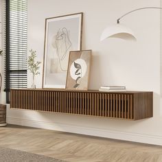 a wooden shelf sitting on top of a hard wood floor next to a white wall