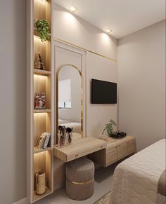 a bedroom with a bed, mirror and dressing table in front of a tv on the wall