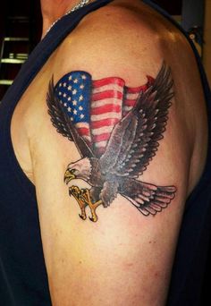 an eagle with the american flag on it's back is shown in this tattoo