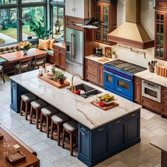 a large kitchen with an island in the middle and lots of counter space on one side