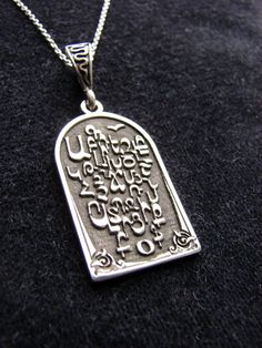 Armenian Alphabet Silver Necklace, Armenian Letters. Armenian Handmade Jewelry, Silver Chain as a Gift, Armenian Letters, Gift for Her / Him.The original pendant with beautiful engraving of the Armenian alphabet made of high-quality sterling silver (925 stamp is on the ring). Master used the method of blackening to highlight the ornament on the pendant.weight of the pendant - 6.2 gramHeight of pendant - 3.8 cm / 1.5 incheswidth - 1.8 cm / 0.7 inchesAs a gift you will get also sterling silver cha Letters Gift, Armenian Alphabet, Ring Master, Armenian Jewelry, Pomegranate Earrings, Alphabet Pendant, Lucky Bracelet, Purple Stones, Evil Eye Bracelet