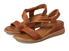 Comfortiva Marcy - Women's Sandals : Luggage : Unwind in effortless style wearing the Comfortiva Marcy. Embrace every step with the plush embrace of its asymmetrical leather sling upper and polyester lining construction. The cushioned padded footbed ensures exquisite comfort, while the comfortable demi wedge and EVA insole promise support and stability. Slip into luxury effortlessly. Rubber outsole. Imported. Measurements: Heel Height: 1 1 2 in Weight: 11.2 oz Product measurements were taken using size 6, width M (B). Please note that measurements may vary by size. Us Size 10, Leather Wedges, Women's Sandals, Tan Leather, Product Reviews, Women's Shoes Sandals, Effortless Style, Womens Sandals, Shoes Sandals