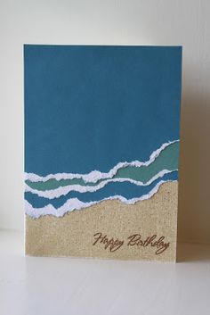 a card with the words happy birthday written on it and waves coming in from the ocean