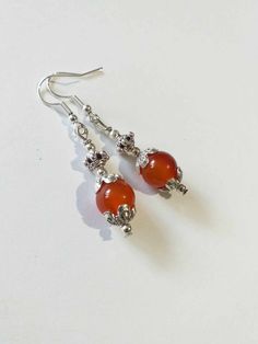 Carnelian Victorian Silver earrings Boho Earrings Silver Carnelian earrings orange-red jewelry Carnelian earring Carnelian jewelry gift set Carnelian Victorian earrings Bohemian earrings . Beautiful Set of silver-tone ornament beads and Genuine Carnelian necklace and earrings. Silver-tone Victorian style necklace and earrings. Boho necklace. Bohemian necklace and earrings. Romantic necklace and earrings. Beautiful necklace with same style earrings with Genuine Carnelian.  Perfect Gift for girlfriend,  mother,  sister,  bridesmaids or Maid of honor. Gift for special people or jewelry set for your special occasion. You may choose from the options menu from: earrings,  jewelry set earrings and necklace,  and jewelry set earrings and necklace + same style bracelet. FREE SHIPPING   Material: si Orange Natural Stones Drop Earrings, Orange Natural Stone Drop Earrings, Orange Gemstone Dangle Earrings, Red Carnelian Pierced Earrings, Red Carnelian Earrings, Silver Carnelian Drop Earrings, Carnelian Drop Earrings Jewelry Gift, Round Carnelian Earrings, Carnelian Drop Earrings With Natural Stones