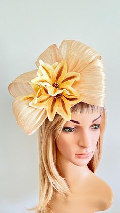 Complete your race day or special event outfit with this stunning handmade butter yellow lily and beige fascinator on a headband. This headpiece is made with silk abaca fabric, features yellow lily flowers, and is perfect for weddings or parties. The one-size-fits-all design ensures a comfortable and secure fit, making it a must-have accessory for the Melbourne Cup or any other glamorous occasion. Elevate your style with this elegant, vibrant headpiece that will turn heads and make you feel fabu Luxury Yellow Headpieces For Races, Yellow Fitted Headpiece For Races, Yellow Spring Party Fascinator, Yellow Adjustable Fascinator Hat, Elegant Yellow Headband Fascinator, Yellow Fascinator, Special Event Outfit, Melbourne Cup, Fascinator Headband