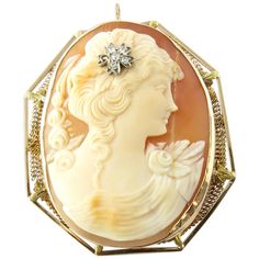 Vintage 14 Karat Yellow Gold and Diamond Cameo Brooch/Pendant- This stunning cameo features a lovely lady in profile adorned with five single cut diamonds and one rose cut diamond in her hair. Framed in delicate 14K yellow gold filigree. Can be worn as a brooch or a pendant. Approximate total diamond weight: .12 ct. Diamond color: J Diamond clarity: I1 Size: 47 mm x 42 mm Weight: 10.1 dwt. / 15.8 gr. Hallmark: 14K Very good condition, professionally polished. Will come packaged in a gift box and will be shipped U.S. Priority Mail Insured. Antique Cameo Jewelry, Cameo Jewelry, Vintage Cameo, Antique Brooches, Art Nouveau Jewelry, Carved Shell, Cameo Brooch, Cameo Pendant, Gold Filigree