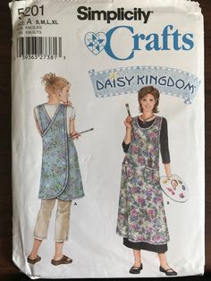 an image of a woman's dress and apron sewing pattern on the cover of a magazine