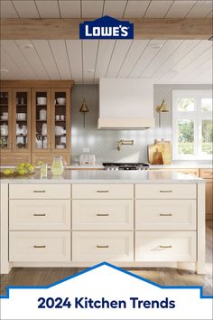 a kitchen with white cabinets and wood flooring is featured in the magazine's cover