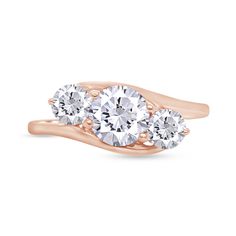 three stone engagement ring in rose gold with two diamonds on the top and one diamond at the bottom