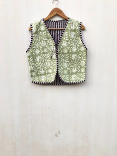 Indian Handmade Block Print Jackets, Coats, Boho ,Quilted, For Women`s Jacket. Made In India Size - All Size WE INCREASE SIZE MEASURE AND UPDATED Small Size - Chest -38 inch Length- 20.5 inch Sleeves -22inch Medium Size - Chest-40 inch Length- 20.5 inch Sleeves -22 inch Large Size - Chest- 42 Inch Length- 21 inch Shoulder -15.5 inch Sleeves -22 inch XL Size - Chest -44 inch Length - 21 Inch Shoulder-16 inch Sleeves - 23 inch XXL size Chest- 46- inches Length -22 inches Shoulder-17 inch Sleeves - Green Sleeveless Fitted Nehru Jacket, Sleeveless Patchwork Outerwear For Summer, Green Sleeveless Vest With Patchwork, Green Sleeveless Patchwork Vest, Green Patchwork Vest For Spring, Spring Green Patchwork Vest, Fitted Sleeveless Patchwork Vest, Green Sleeveless Cotton Outerwear, Bohemian Sleeveless Fitted Outerwear