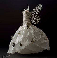 an origami dress with butterflies on it