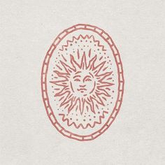 a drawing of a sun in the middle of a circle with red lines on it