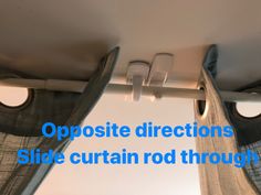 the curtains are open and there is no image on this page to describe, opposite directions slide curtain rod through