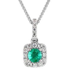 The vibrant green color of the emerald in this fabulous necklace, epitomizes life and hope. Its round cut gemstone glows with green lights, highlighted by a frame of shimmering diamonds provide the perfect accent as they also flow down the bail. - Twenty one diamonds are finely cut for brilliance, near colorless, prong set and weigh 1/7ct tw - Diamonds are certified to be ethically and responsibly sourced - Emerald is securely held in a prong setting and measures 3.9mm - Necklace is crafted of f Green Lights, 20 Wedding Anniversary, Necklace With Diamond, Emerald Necklace, Original Card, Emerald Stone, Vibrant Green, Diamond Halo, Twenty One