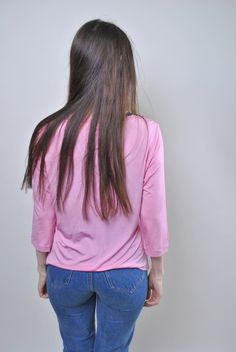 "Vintage pink minimalist blouse, 90s Italian pullover shirt, Size L Welcome to TARASCOMMON.ETSY.COM Unique clothing from the 20th century. Model tall - 170cm L. Sleeve - 32cm / 12.59inch; ( armpit to end of sleeve); Width - 46cm / 18.11inch; Length - 56cm / 22.04inch. All measurements are taken seam to seam while lying flat. Acetat/ Elastan. Made in Italy. This item is vintage, so it can have some defects. Additional photos can be send We are glad that you are interested in lots that we sell. Wi Pink Stretch Shirt For Spring, Pink Stretch Crew Neck Shirt, Pink Long Sleeve Stretch T-shirt, Pink Stretch Cotton Shirt, Pink Relaxed Fit V-neck Shirt, Stretch Cotton Pink Shirt, Casual Pink Stretch Long Sleeve Top, Pink Casual Long Sleeve Crew Neck Top, Pink Stretch Casual Blouse