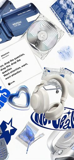 various items are arranged in the shape of a heart, including headphones and an mp3 player