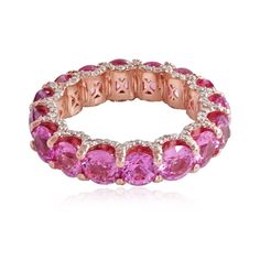 a ring with pink stones and diamonds