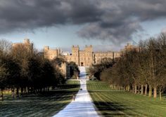 an image of a long road going to a castle