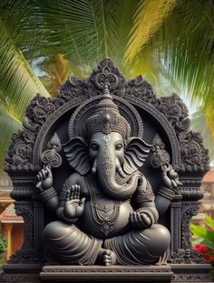 an elephant statue sitting on top of a wooden platform in front of palm trees and flowers