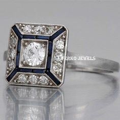 Vintage Art Deco Unique Ring/Blue Sapphire & Round Diamond Ring/Antique Square Shape Rustic Milgrain Ring/Woman's Wedding Engagement Ring 𝐂𝐞𝐧𝐭𝐞𝐫 𝐒𝐭𝐨𝐧𝐞 𝐃𝐞𝐭𝐚𝐢𝐥𝐬 ↣ Shape : Round ↣ Size : 5mm ↣ Color : White  ↣ Clarity : vvs ↣ Luster : excellent ↣ Make : high quality ✥ 𝐒𝐢𝐝𝐞 𝐒𝐭𝐨𝐧𝐞 𝐃𝐞𝐭𝐚𝐢𝐥𝐬 ↣ Shape : Round & Baguette ↣ Color : White - Blue Sapphire ↣ Clarity : vvs ↣ Luster : excellent ↣ Make : high quality ↣ Metal : rose gold - yellow gold -white gold - 925 silver ↣ Making Process : Handmade - crafted by our experienced team ↣ Metal Stamp : yes ✥ 𝐅𝐫𝐞𝐞 𝐄𝐧𝐠𝐫𝐚𝐯𝐢𝐧𝐠 The stones in jewelry are 100% hand-crafted it is cut and polished by our experienced craftsman. Provide you with the best service. -----ENGRAVING IS AVAILABLE ----- > name > birth date > enga Antique White Rings With Halo Setting, Vintage White Rings With Halo Setting, Antique Adjustable Rings For Anniversary, Art Deco White Jewelry With Center Stone, White Art Deco Jewelry With Center Stone, Antique White Jewelry With Center Stone, Antique Diamond White Jewelry With Halo Setting, Art Deco White Ring Jewelry, Adjustable Victorian Rings For Anniversary