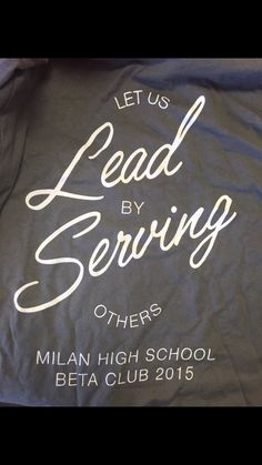 there is a t - shirt that says let us lead by serving others, and the words mean high school