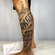 a man with a tattoo on his leg that reads, i'm not afraid to see